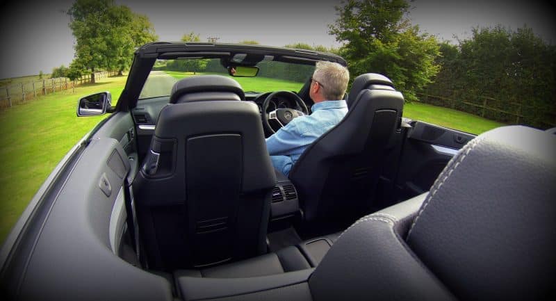 Man shows off convertible car