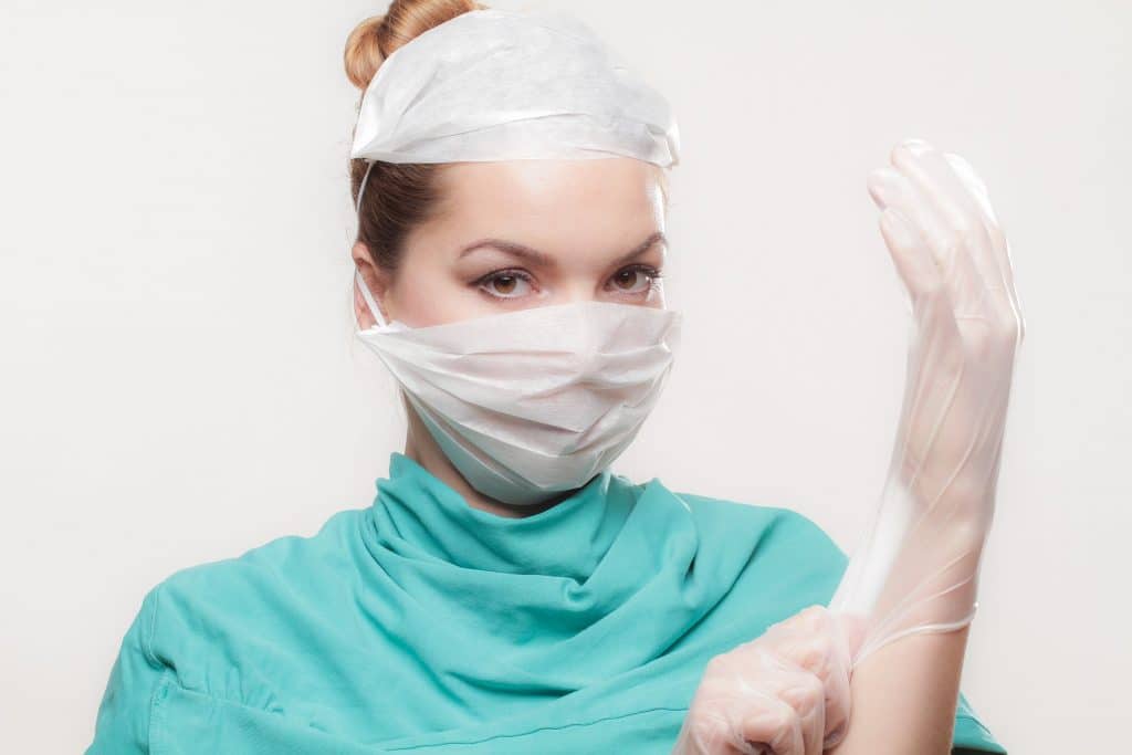 Nurse Lorraine Fisher, 34, prepares for the examination