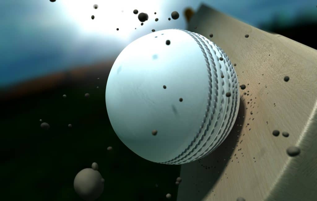 Cricket ball on bat