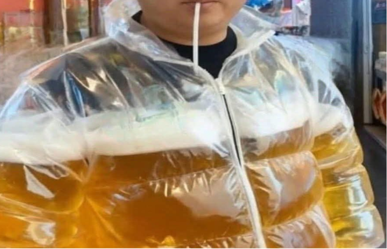 Forget beer goggles, Ipswich footy fans prefer the beer puffa jacket