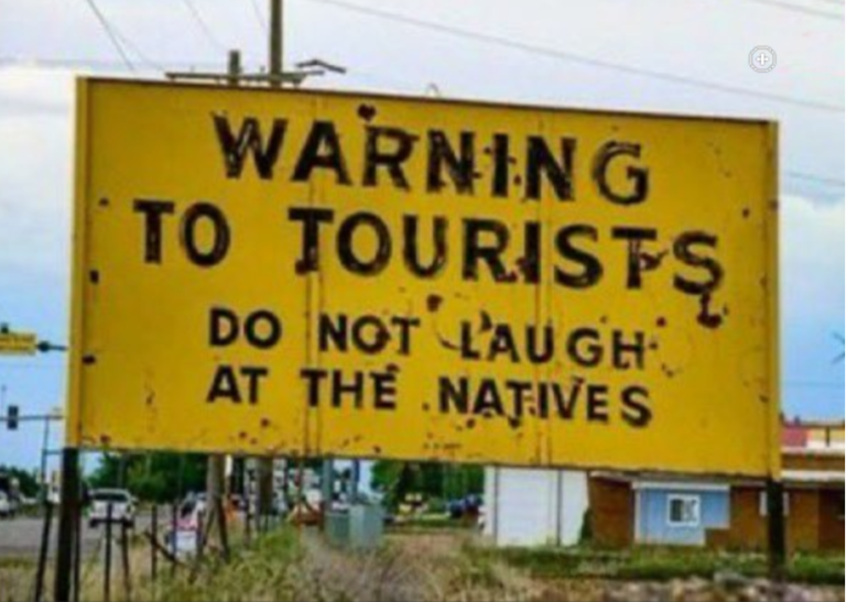 Norfolk erects border signs warning tourists not to laugh at the natives